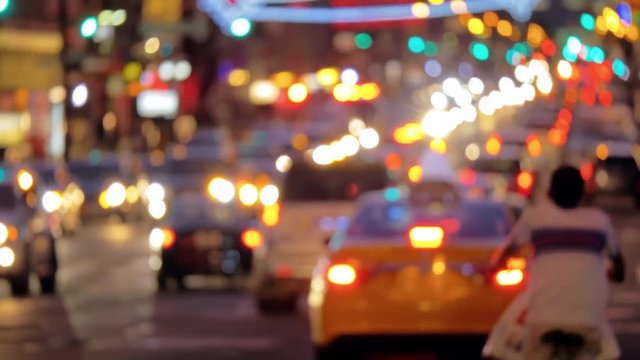 Colourful footage of congested busy street on Manhattan NYC at night