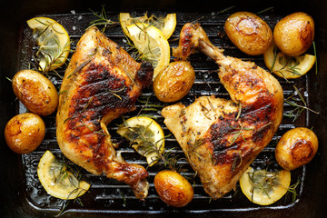 Grilled rosemary lemon  chicken quarters with roasted  potatoes