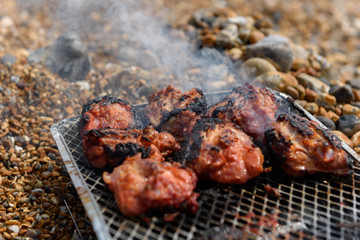 Preparing barbecue on the Beach