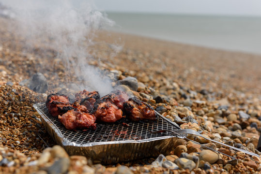 Preparing Barbecue On The Beach