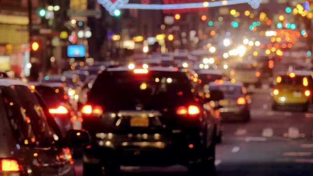 NYC blurred jammed street traffic at night