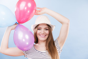 Woman summer joyful girl with colorful balloons