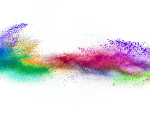 Explosion of colored powder on white background