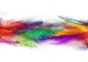 Explosion of colored powder on white background