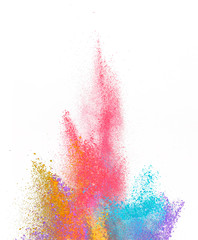 Explosion of colored powder on white background