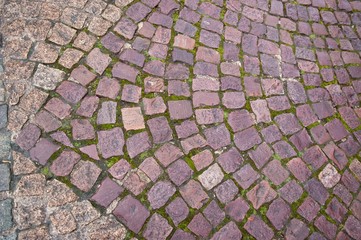 Closeup of stone pavement texture paved in different styles