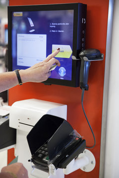 Woman paying with credit card