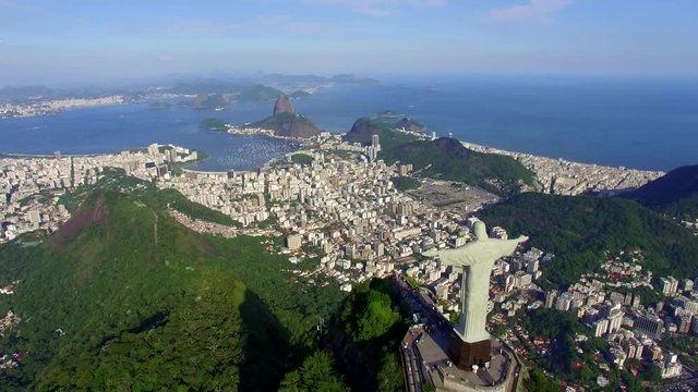 Aerial view of Christ the Redeemer statue and Sugar Loaf mountain in Rio de Janeiro, Brazil. 