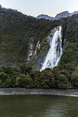 Fototapeta na wymiar huge waterfalls at Milford sound