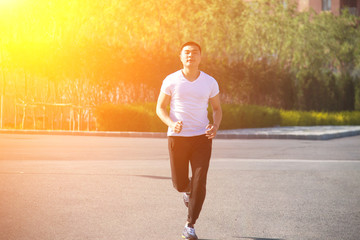 Young Asian man in the running