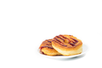 Unhealthy fat donuts with a berry jam