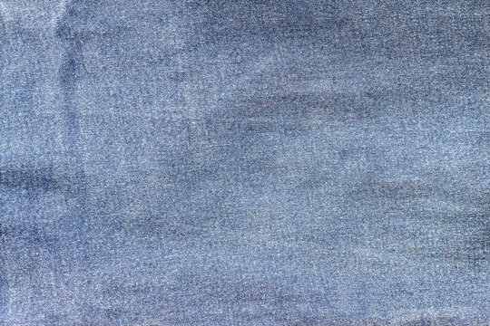 Blue denim jeans closed up texture.