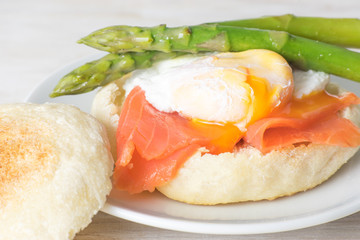 Close up of English muffin with poached egg