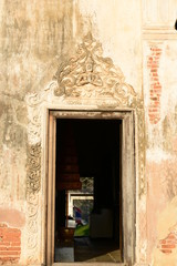 Old church before sunset at Wat Mai Amphawan, Korat Thailand 

Foreign language on the Door frame means Built date of this church.