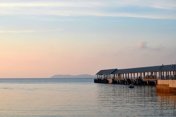 Obraz premium Tioman, Malaysia - April 18, 2016: The jetty at Kampung Tekek which receives light commercial and passenger vessels from mainland ports of Mersing and Tanjong Gemok. It is a popular diving spot.