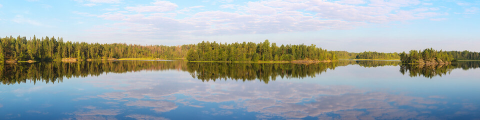 Fototapeta na wymiar sunny summer mornig on lake