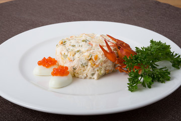 Russian salad with crayfish