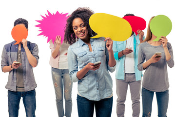 Naklejka premium Students with speech bubbles and gadgets