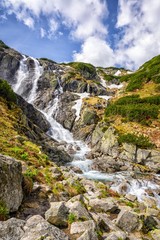 Mountain waterfall Siklawa in Polish Tatra