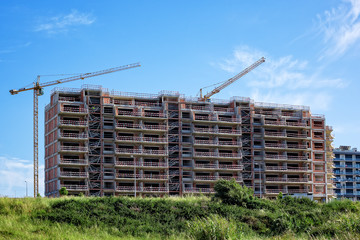 Building Crane and Building Under Construction
