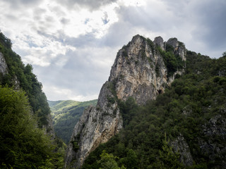 Fototapeta na wymiar Gorge Near the City of Tran, Bulgaria. Landscape of a Peak With
