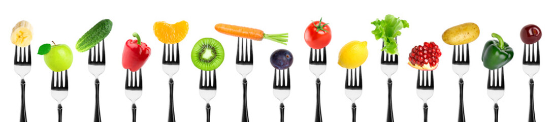Fruits and vegetables on fork