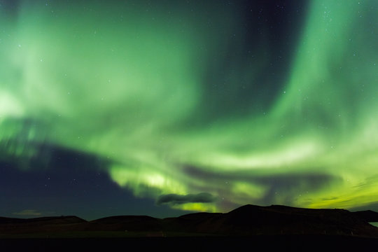 Aurora borealis. Northern lights in Iceland Myvatn. Stars in nig