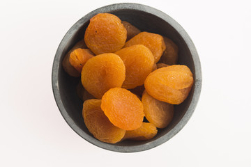 Delicious dried apricots in a bowl