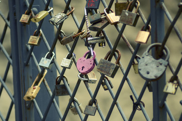 fence with the locks of love symbol