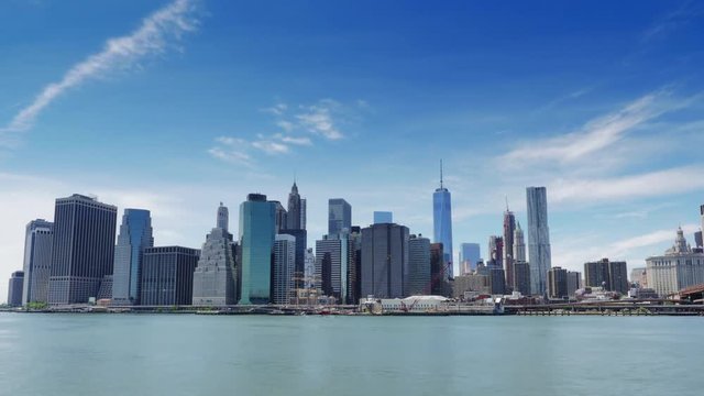 NYC New York City panoramic cityscape Manhattan skyline sunny day blue sky time lapse
