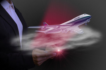 with tablet plane takes off, concept of high-tech aviation