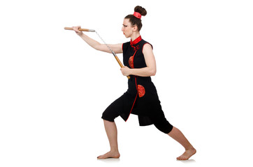 Funny woman with nunchucks isolated on white