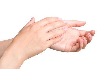 Female manicured hands isolated on white background