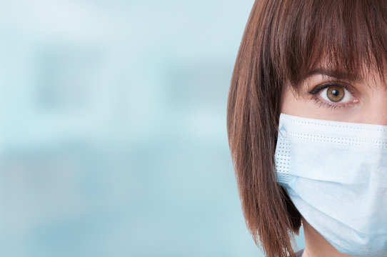 Close-up Of Half Face And Right Eye Of Woman Doctor