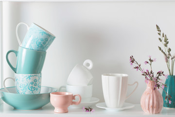 Clean dishes on wooden shelf