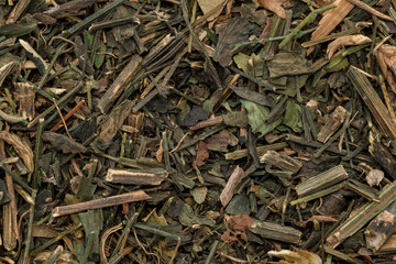 Organic dry Kalmegh or Green chiretta leaves (Andrographis paniculata). Macro close up background texture. Top view.