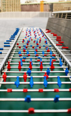 red and blue table soccer players, selective focus.