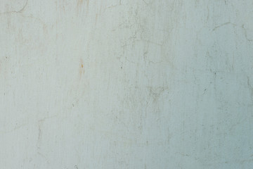 Wall fragment with scratches and cracks