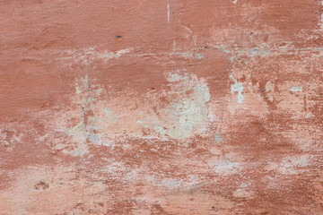 Wall fragment with scratches and cracks