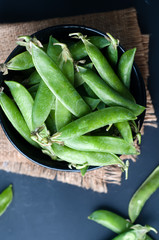 Fresh, young, unpeeled green peas