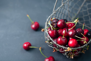 Cherries on black table