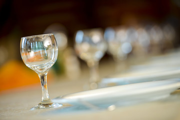 Row of glasses with reflective natural light