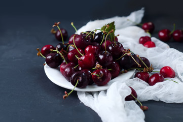 Fresh cherries in plate
