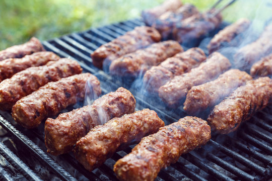 traditional food Meat Balls "mici" on grill