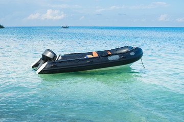 Black inflatable boat..