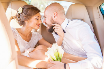 Newlyweds in car