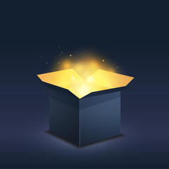 Blue box with magic golden light on dark - 112123783