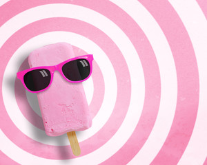 Ice cream stick wearing sunglasses on circle pattern pink and white background with copy space.,Pastel tone.