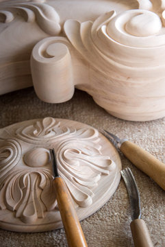 Timber, wood processing. Joinery work. wood carving with work tools close up. small depth of field. used as background