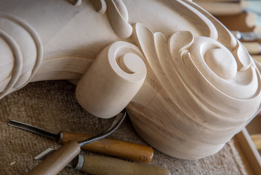 Timber, wood processing. Joinery work. wood carving with work tools close up. small depth of field. used as background